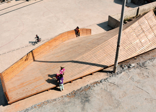 Illustration for article titled The Roof of This Sloped Library Doubles as an Awesome Slide